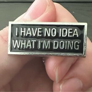 Silver and Black Enamel Pin